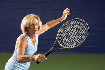 senior health and ftiness tennis volley