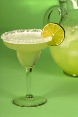 margarita with a pitcher of margaritas