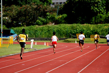 runner running on the track in the stadium