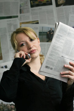 newspaper - businesswoman - mobile phone