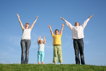 family  with hands up