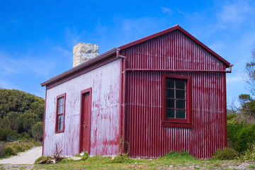 red fishing shack