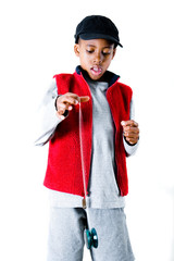 boy standing and playing with yo-yo - 3411874