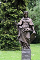 sculpture of austria in park in graz