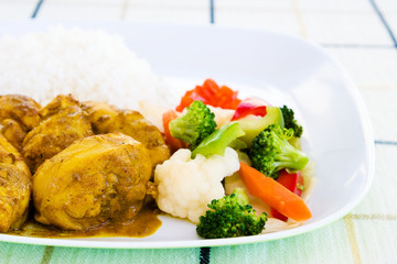 curried chicken with rice and vegetables - jamaica