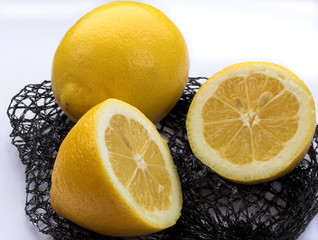 sliced and whole lemons