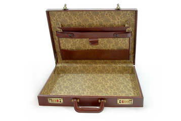 Opened brown business suitcase - isolated