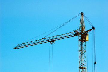 construction crane against blue sky