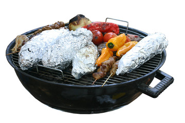 Photo of a grill with a delicious beef meat and vegetables on it