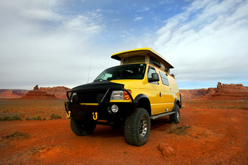 camping with yellow rv van