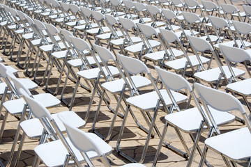 array of white chairs