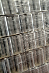industrial packaging - pallet of metal cans