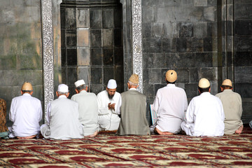 praying time in mosque. shrinagar, kashmir