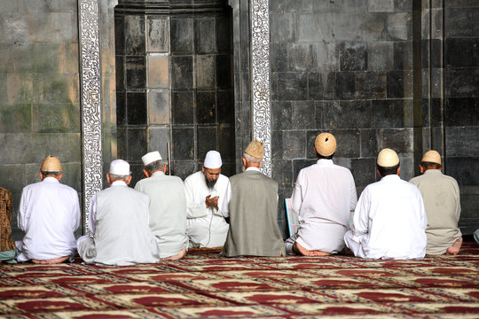praying time in mosque. shrinagar, kashmir