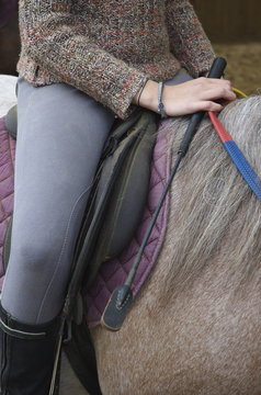 en selle