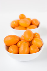 kumquats in bowls