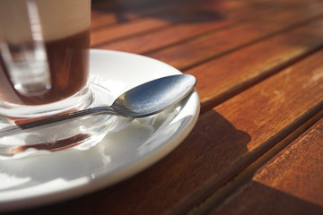 glass coffee mug on wooden table