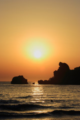 beautiful beach at sunset on corfu island, greece