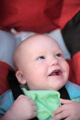 baby sitting in stroller. close-up #2