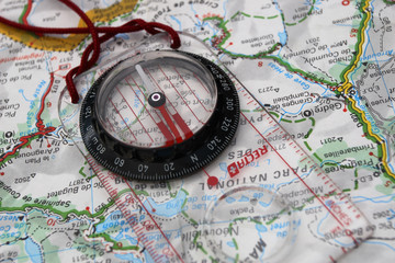 Fototapeta na wymiar compass on map