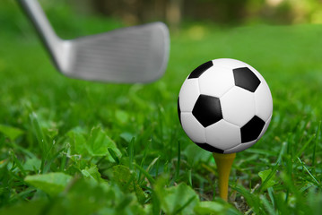 soccer ball on golf tee