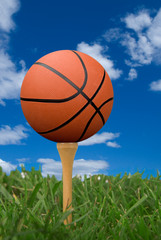 basketball on golf tee