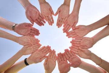 The group has connected hands