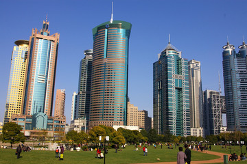 Naklejka premium surrounded by modern skyscrapers in shanghai, china