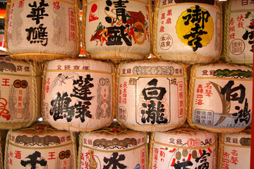 a traditional stack of japanese saki barrels 