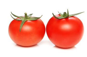 two tomatoes isolated on the white background