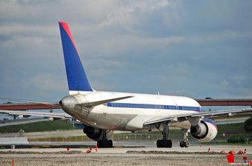 Fototapeta na wymiar tail view of jet airplane