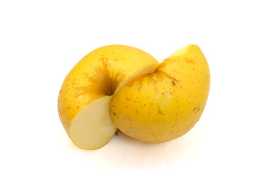 Naklejka na ściany i meble yellow apple cut in half