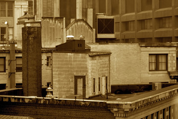 sepia image of roof top of old building in boston