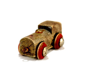 old toy car on white background