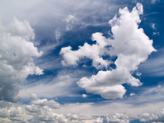 blue summer sky with bright clouds. horizontal