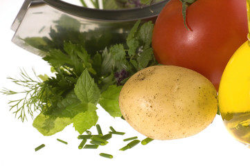 fresh herbs, vegetables, salt and mezzaluna.