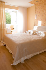 Sunny bedroom early morning