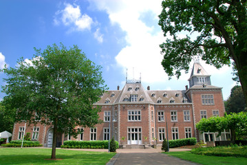 Obraz premium Residential house, villa in the suburbs with formal garden, 