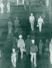 Surreal image of people in shopping mall.