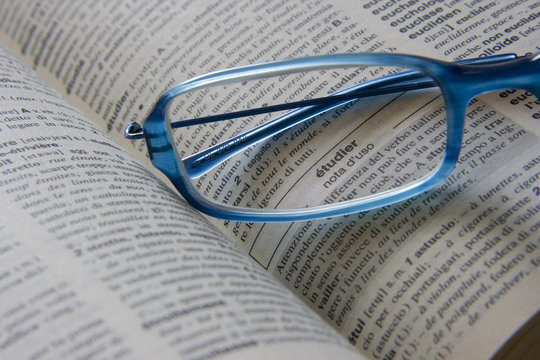 Glasses on a french dictionary