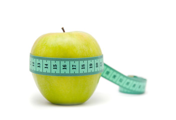 Fruit with measuring tape. isolated on white