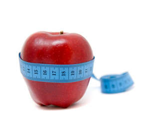 Fruit with measuring tape. isolated on white