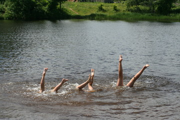 kids playing in the lake