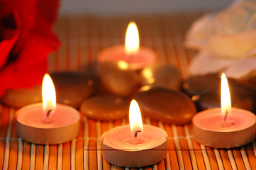 Aromatic candles and pebbles  for spa session