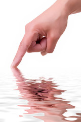 Hand of a woman with water reflection over white background