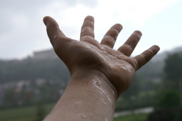 hand in the rain