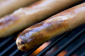 summer bbq staple hotdogs on the grill