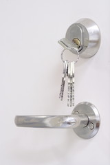 Keys, keyhole and doorhandle
