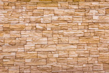Wall constructed of fragments of stones.