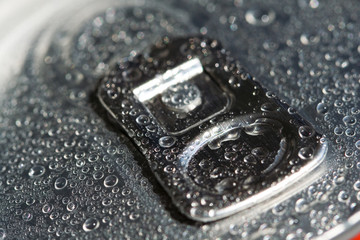 Macro shot on cold cola can. Very shallow depth.